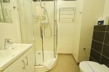 Фото номера Апартаменты с балконом Апартаменты Baltic Home Aquamarina г. Свиноуйсьце 8