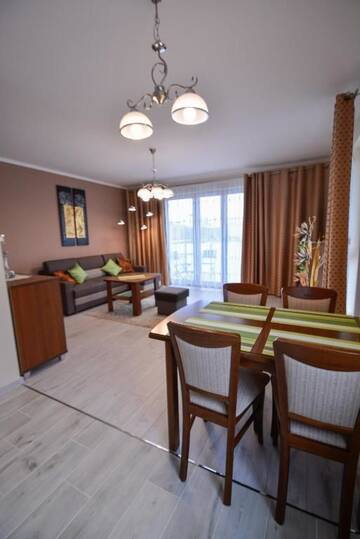 Фото номера One-Bedroom Apartment with Parking Place Апартаменты Apartamenty Bryza - Ulanska г. Свиноуйсьце 8