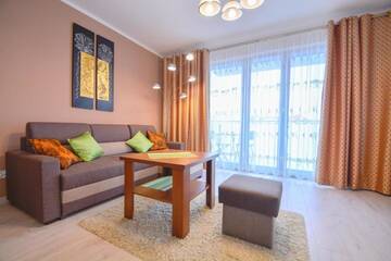 Фото номера One-Bedroom Apartment with Parking Place Апартаменты Apartamenty Bryza - Ulanska г. Свиноуйсьце 9
