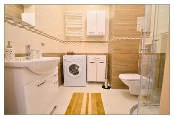 Фото номера One-Bedroom Apartment with Parking Place Апартаменты Apartamenty Bryza - Ulanska г. Свиноуйсьце 7