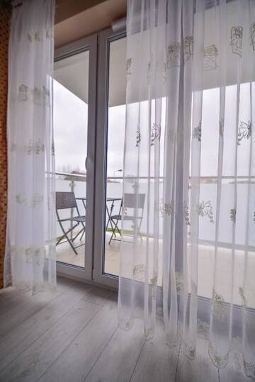Фото номера One-Bedroom Apartment with Parking Place Апартаменты Apartamenty Bryza - Ulanska г. Свиноуйсьце 10