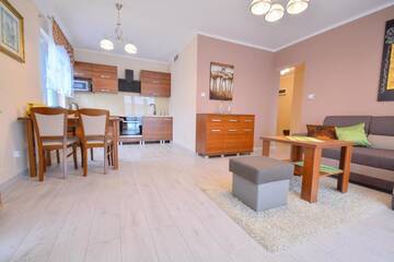 Фото номера One-Bedroom Apartment with Parking Place Апартаменты Apartamenty Bryza - Ulanska г. Свиноуйсьце 13
