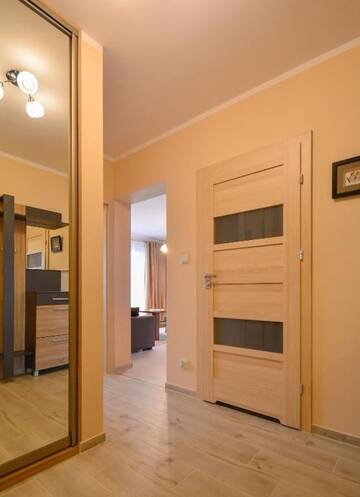 Фото номера One-Bedroom Apartment with Parking Place Апартаменты Apartamenty Bryza - Ulanska г. Свиноуйсьце 17