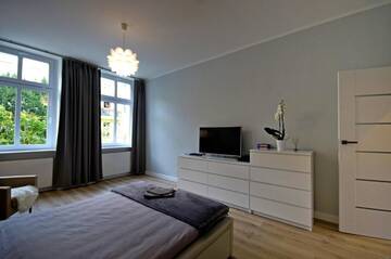 Фото номера Апартаменты с 2 спальнями Апартаменты Apartament Paderewskiego 12m2 г. Свиноуйсьце 77