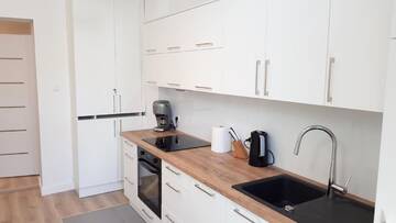 Фото номера Апартаменты с 2 спальнями Апартаменты Apartament Paderewskiego 12m2 г. Свиноуйсьце 11