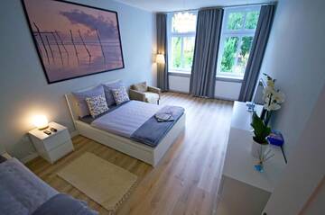 Фото номера Апартаменты с 2 спальнями Апартаменты Apartament Paderewskiego 12m2 г. Свиноуйсьце 28