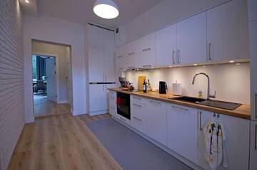 Фото номера Апартаменты с 2 спальнями Апартаменты Apartament Paderewskiego 12m2 г. Свиноуйсьце 10
