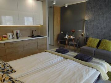Фото номера Апартаменты с балконом Апартаменты 4UApart-Apartment studio Mohito г. Свиноуйсьце 38