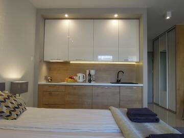 Фото номера Апартаменты с балконом Апартаменты 4UApart-Apartment studio Mohito г. Свиноуйсьце 39