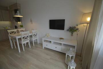 Фото номера Апартаменты с 1 спальней и балконом Апартаменты Apartamenty na Wyspie - Zdrojowa г. Свиноуйсьце 8