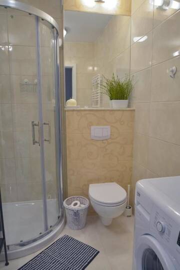 Фото номера Апартаменты с 1 спальней и балконом Апартаменты Apartamenty na Wyspie - Zdrojowa г. Свиноуйсьце 9