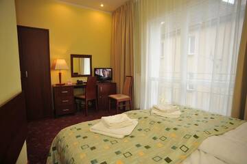 Фото номера Двухместный номер с 1 кроватью Курортные отели Hotel Atol г. Свиноуйсьце 4