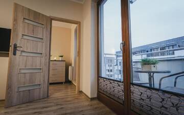 Фото номера Апартаменты с балконом Апартаменты Apartament Wojska Polskiego 18c г. Свиноуйсьце 14
