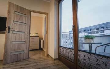 Фото номера Апартаменты с балконом Апартаменты Apartament Wojska Polskiego 18c г. Свиноуйсьце 27