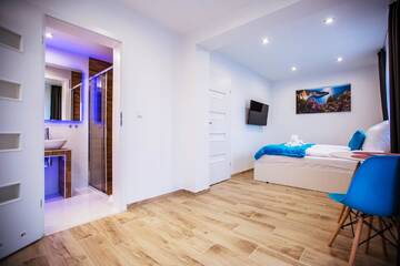 Фото номера Двухместный номер с 1 кроватью Апарт-отели Adonis Apartments г. Свиноуйсьце 3
