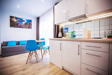 Фото номера Стандартный трехместный номер-студио Апарт-отели Adonis Apartments г. Свиноуйсьце 8