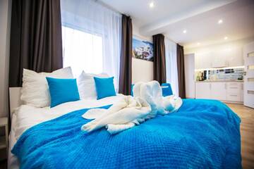 Фото номера Двухместный номер эконом-класса с 1 кроватью Апарт-отели Adonis Apartments г. Свиноуйсьце 2