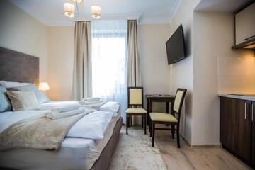 Фото номера Двухместный номер с 1 кроватью Апарт-отели Villa Baltica г. Свиноуйсьце 4