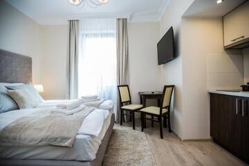 Фото номера Двухместный номер с 1 кроватью Апарт-отели Villa Baltica г. Свиноуйсьце 4