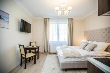 Фото номера Двухместный номер Делюкс с 1 кроватью Апарт-отели Villa Baltica г. Свиноуйсьце 2