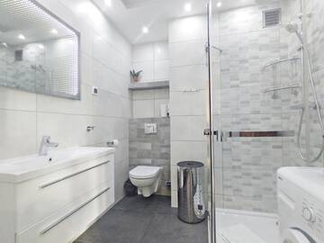 Фото номера Апартаменты с 3 спальнями Апартаменты Baltic Home Apartament Mercedes г. Свиноуйсьце 46