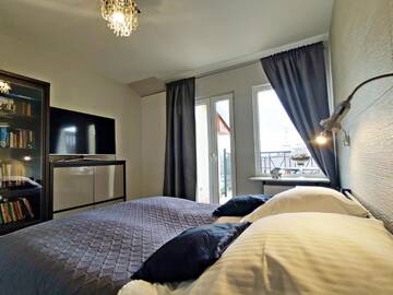 Фото номера Апартаменты с 3 спальнями Апартаменты Baltic Home Apartament Mercedes г. Свиноуйсьце 14