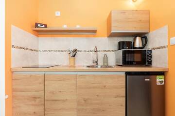 Фото номера Номер-студио с балконом Апартаменты Wind Rose Quarter Apartments by Renters г. Свиноуйсьце 6
