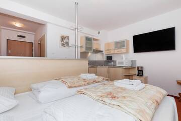 Фото номера Стандартный номер-студио Апартаменты Apartamenty przy Promenadzie by Renters г. Свиноуйсьце 12
