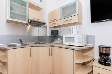 Фото номера Стандартный номер-студио Апартаменты Apartamenty przy Promenadzie by Renters г. Свиноуйсьце 14
