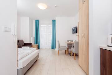 Фото номера Апартаменты с балконом Апартаменты Apartamenty Aquamarina by Renters г. Свиноуйсьце 10