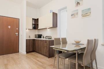 Фото номера Апартаменты с 1 спальней Апартаменты Apartamenty Aquamarina by Renters г. Свиноуйсьце 10