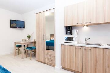 Фото номера Апартаменты Апартаменты Apartamenty Aquamarina by Renters г. Свиноуйсьце 3
