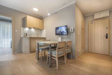 Фото номера Улучшенные апартаменты Апарт-отели Apartamenty Resort ,,Cesarskie Ogrody' г. Свиноуйсьце 7
