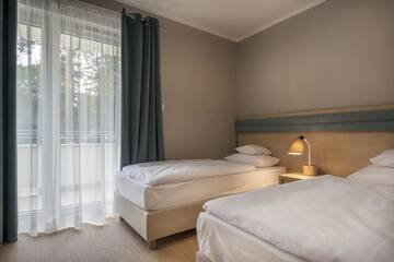 Фото номера Улучшенные апартаменты Апарт-отели Apartamenty Resort ,,Cesarskie Ogrody' г. Свиноуйсьце 5