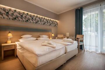 Фото номера Стандартные апартаменты Апарт-отели Apartamenty Resort ,,Cesarskie Ogrody' г. Свиноуйсьце 12