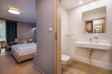 Фото номера Стандартные апартаменты Апарт-отели Apartamenty Resort ,,Cesarskie Ogrody' г. Свиноуйсьце 10
