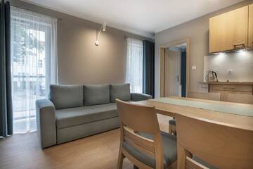 Фото номера Улучшенные апартаменты Апарт-отели Apartamenty Resort ,,Cesarskie Ogrody' г. Свиноуйсьце 6