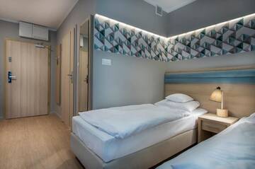 Фото номера Стандартные апартаменты Апарт-отели Apartamenty Resort ,,Cesarskie Ogrody' г. Свиноуйсьце 14