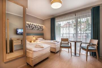 Фото номера Стандартные апартаменты Апарт-отели Apartamenty Resort ,,Cesarskie Ogrody' г. Свиноуйсьце 15