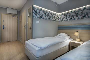 Фото номера Стандартные апартаменты Апарт-отели Apartamenty Resort ,,Cesarskie Ogrody' г. Свиноуйсьце 8