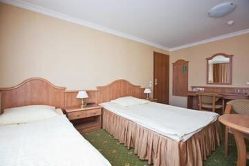 Фото номера Двухместный номер с 1 кроватью или 2 отдельными кроватями Отель Hotel Polaris г. Свиноуйсьце 24