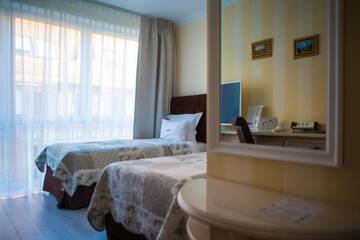 Фото номера Двухместный номер с 2 отдельными кроватями Отель Hotel Ottaviano г. Свиноуйсьце 4