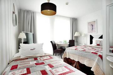 Фото номера Трехместный номер Отель Hotel Ottaviano г. Свиноуйсьце 3