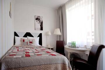 Фото номера Трехместный номер Отель Hotel Ottaviano г. Свиноуйсьце 2